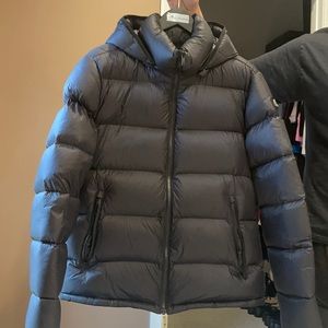 Moose knuckles black puffer jacket. Worn once too big. AMAZING condition